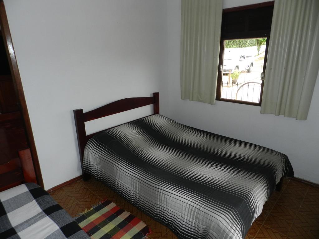 Pousada Hospedaria Santa Clara Santa Rita de Jacutinga Habitación foto